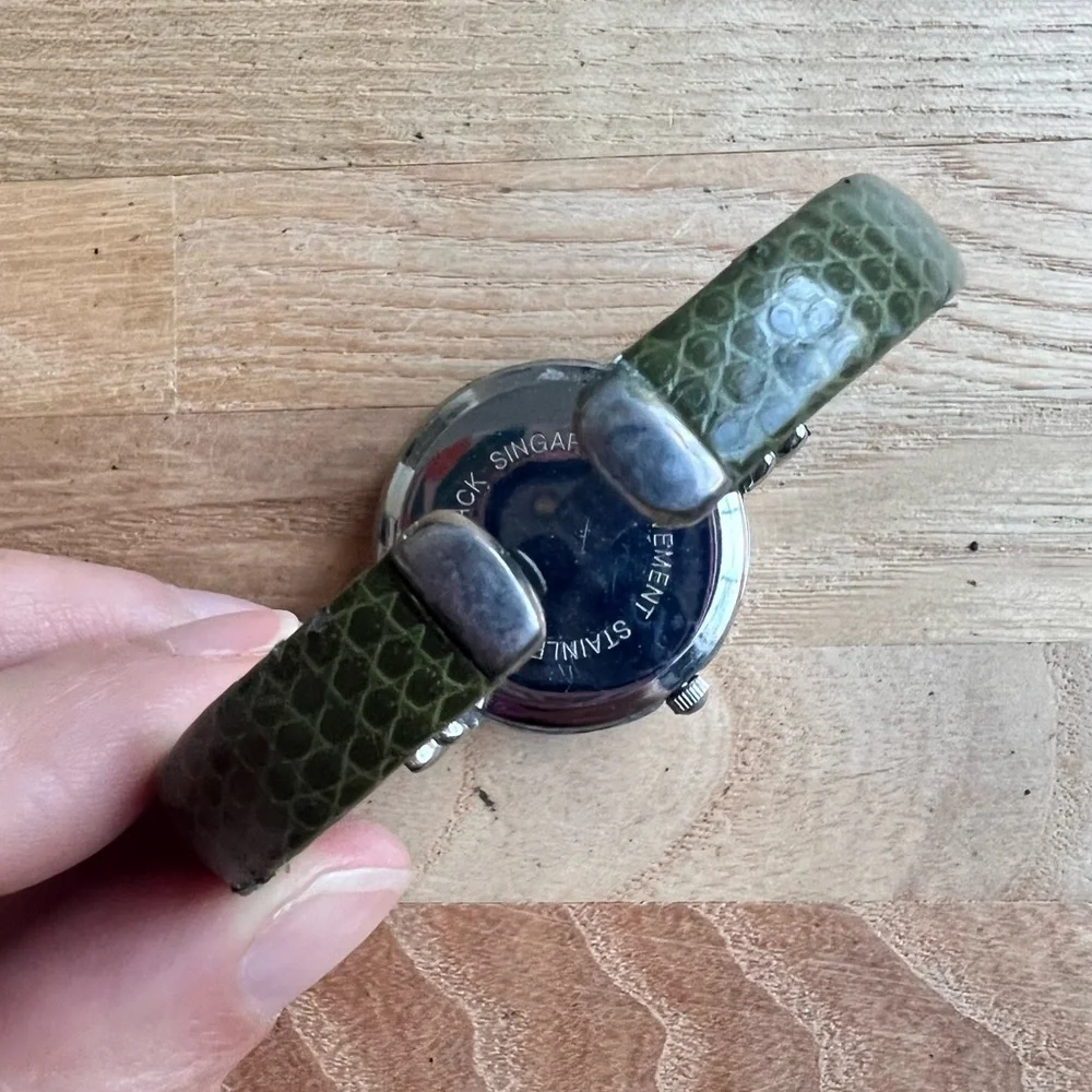 Eikon ladies green hinged cuff watch NEW BATTERY